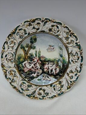 Vintage Capodimonte 14”porcelain hand painted /decorated cherub wall platter